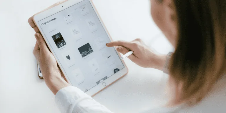 Woman Sitting Beside Table While Using Ipad to create a chatgpt personalised morning routine