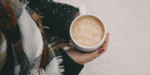 Person Holding Mug of Coffee as part of their winter morning routine