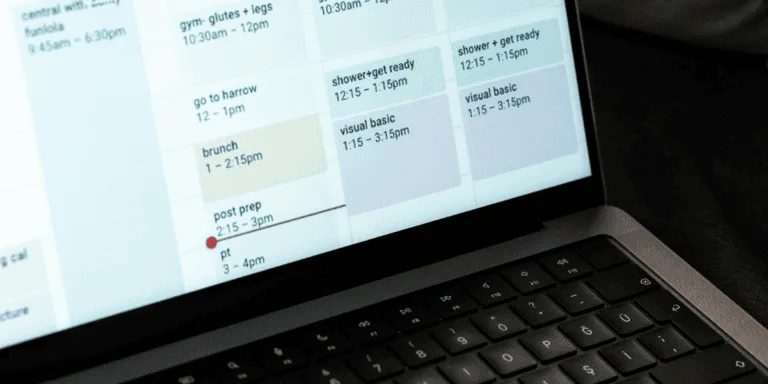 Laptop screen with a detailed weekly schedule featuring tasks and reminders, illustrating structured planning as a quick procrastination hack