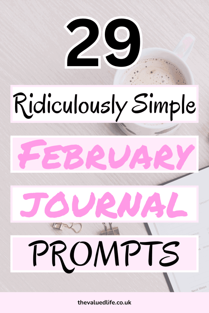 Flat lay of a coffee cup, open planner, and gold binder clips on a light wooden table, featuring bold text that reads '29 Ridiculously Simple February Journal Prompts,'